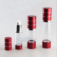 Empty red airless pump bottle for eye serum