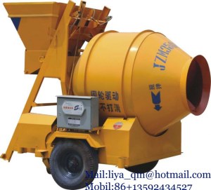 Self loading concrete mixer