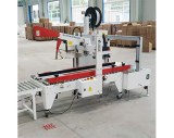 CARTON SEALING MACHINE