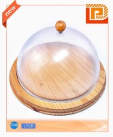 Round wooden chopping board with acrylic cover
